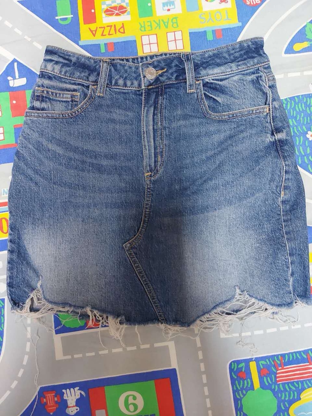 Garage distressed denim mini skirt